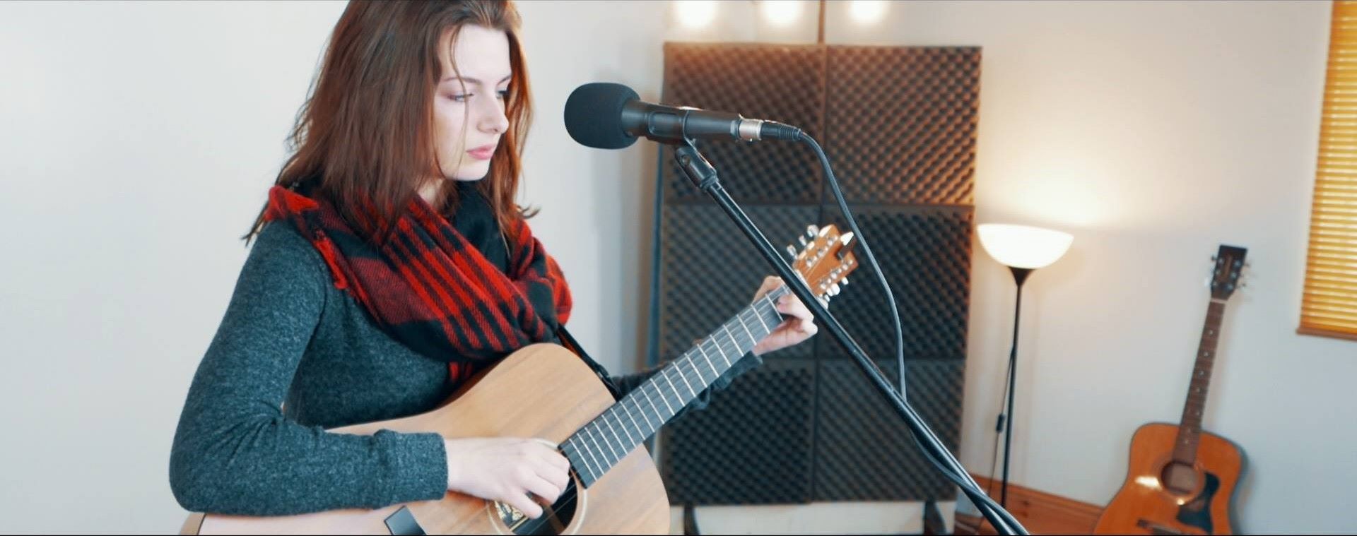Solo musician playing guitar